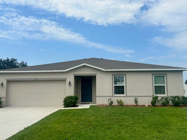 Photo of 971 SW Nichols Terrace, Port Saint Lucie, FL 34953 (MLS # R11012207)