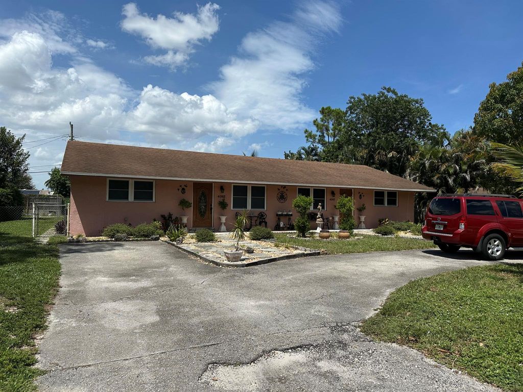 Photo of 4365 Edward Road, West Palm Beach, FL 33406 (MLS # R11119003)