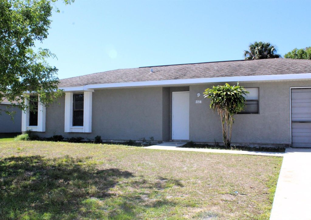 Photo of 2218 SE Master Avenue, Port Saint Lucie, FL 34952 (MLS # R10978773)