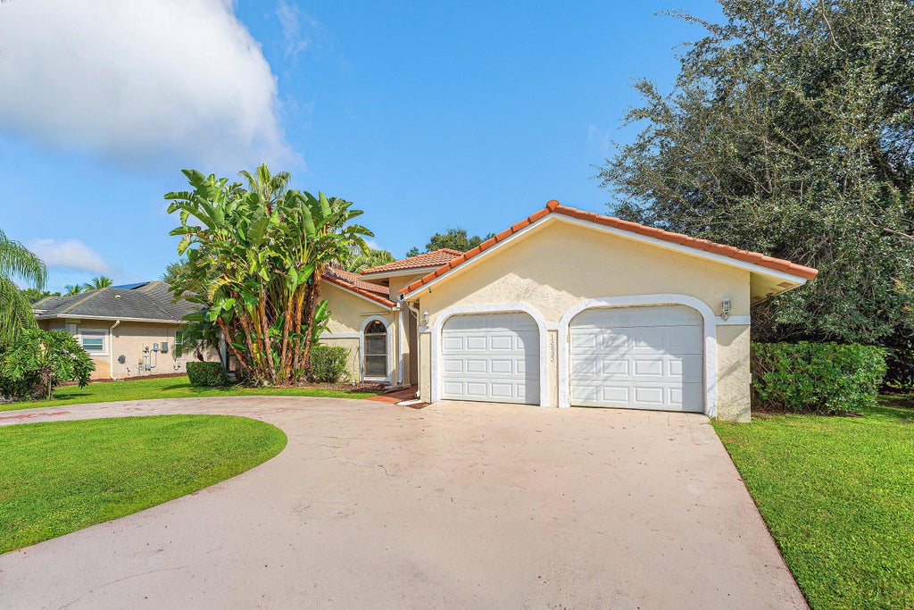 Photo of 13853 SHEFFIELD Street, Wellington, FL 33414 (MLS # B26081140)