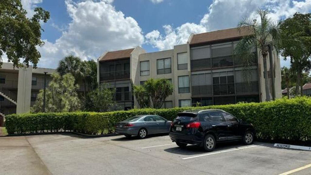 Photo of 8050 W Mcnab Road #203, Tamarac, FL 33321 (MLS # B26043080)