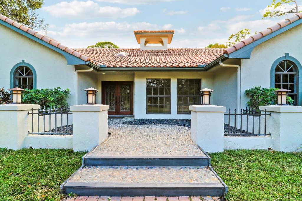 Photo of 67 Pacer Circle, Wellington, FL 33414 (MLS # R11158501)