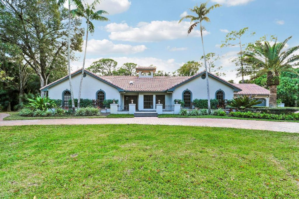 Photo of 67 Pacer Circle, Wellington, FL 33414 (MLS # R11158501)