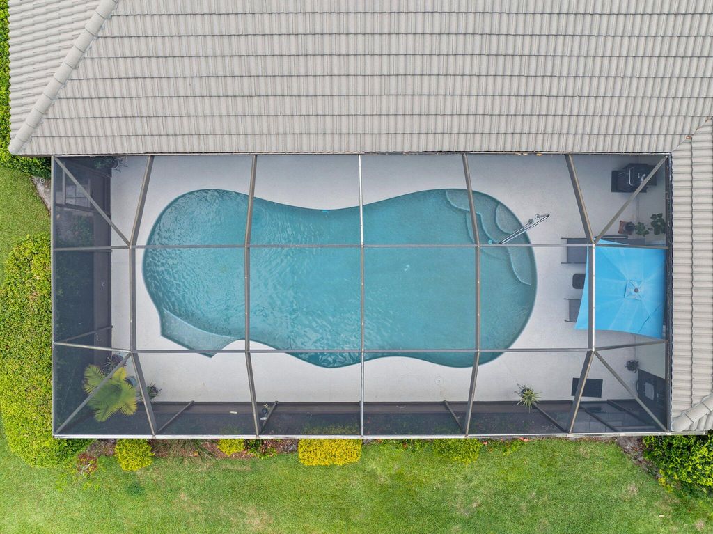 Photo of 1291 SW Cedar Cove, Port Saint Lucie, FL 34986 (MLS # R10990784)