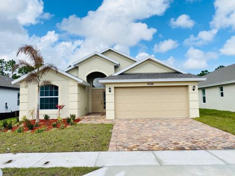 Photo of 9724 Apollo Avenue, Fort Pierce, FL 34945 (MLS # R11168278)