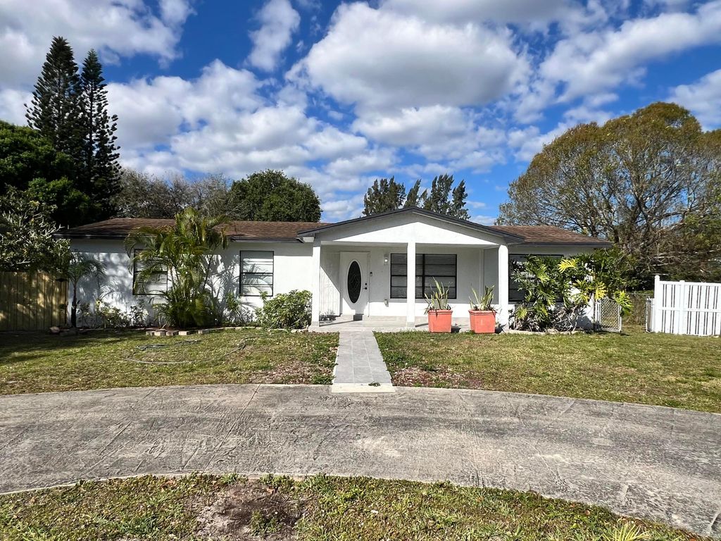 Photo of 695 Dixie Lane, West Palm Beach, FL 33415 (MLS # R10964156)