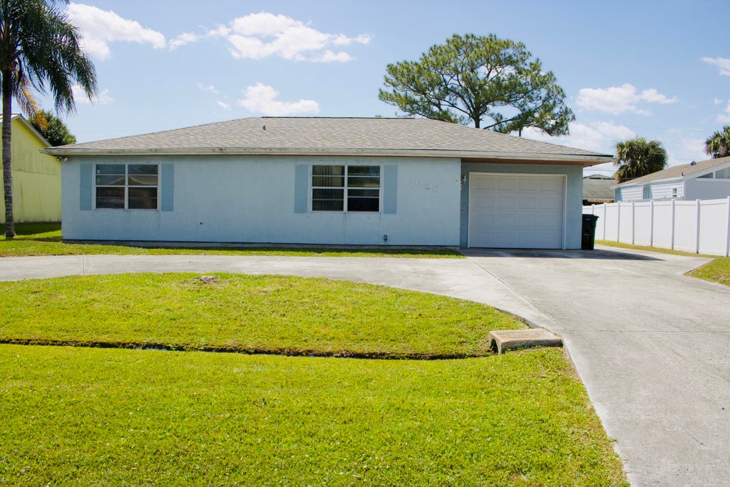 Photo of 1150 SW Ivanhoe Street, Port Saint Lucie, FL 34983 (MLS # R11080846)