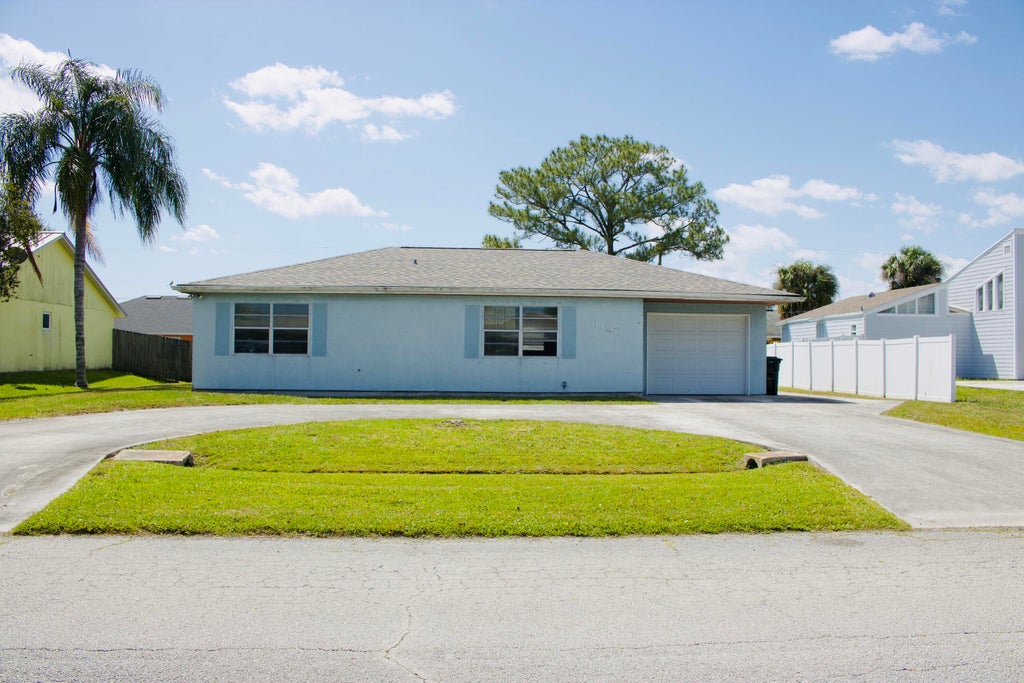 Photo of 1150 SW Ivanhoe Street, Port Saint Lucie, FL 34983 (MLS # R11080846)