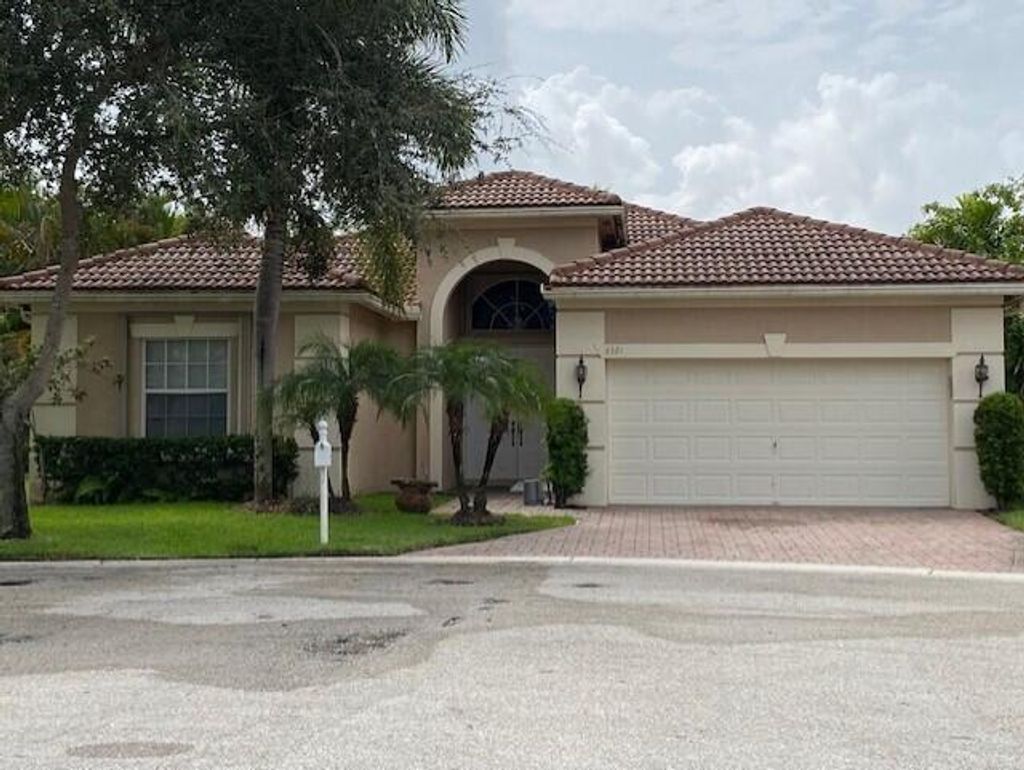 Photo of 8321 Mastic Cay, West Palm Beach, FL 33411 (MLS # R10740620)