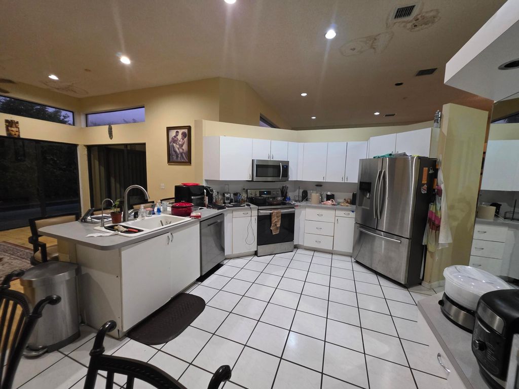 Photo of 4977 NW 97th Drive, Coral Springs, FL 33076 (MLS # B26008214)