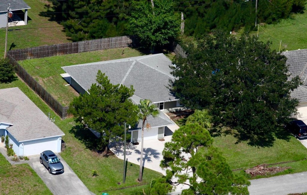 Photo of 1045 SW Bay State Road, Port Saint Lucie, FL 34953 (MLS # R11104083)