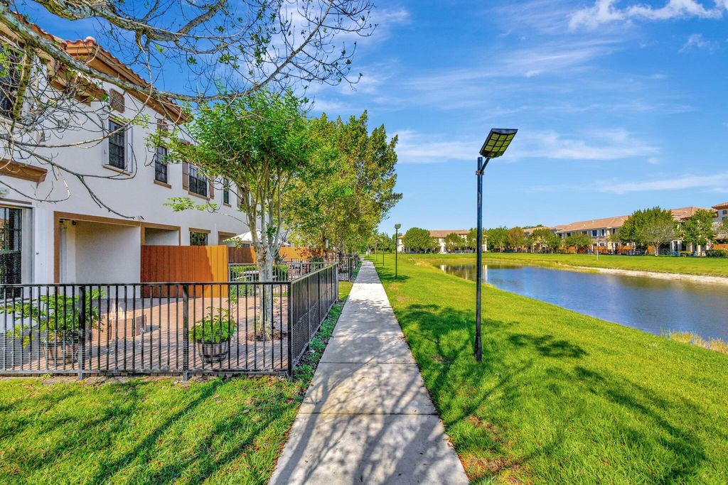 Photo of 10139 Wellington Parc Drive, Wellington, FL 33449 (MLS # B26041958)