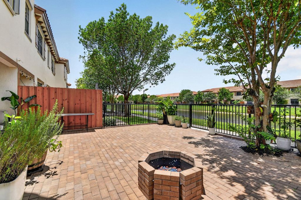Photo of 10139 Wellington Parc Drive, Wellington, FL 33449 (MLS # B26041958)