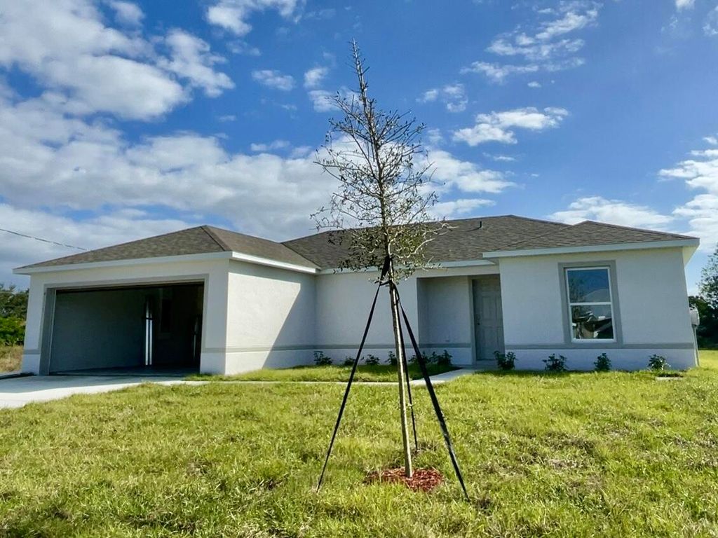 Photo of 4111 SW Baltic Street, Port Saint Lucie, FL 34953 (MLS # B26019228)