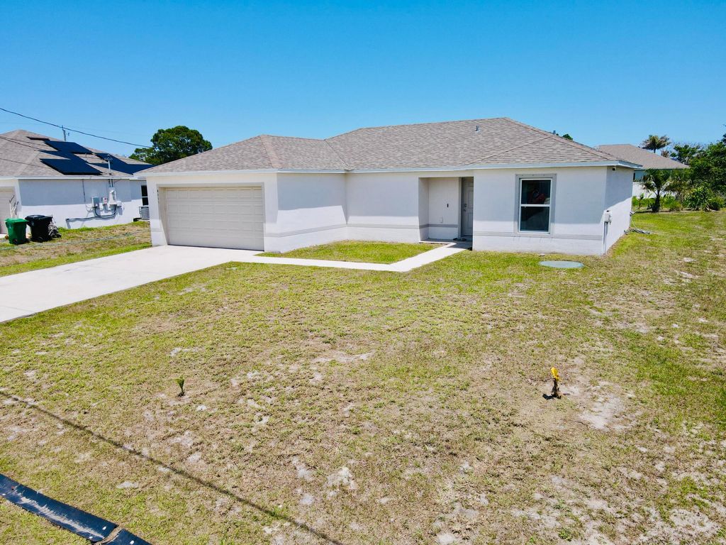 Photo of 4111 SW Baltic Street, Port Saint Lucie, FL 34953 (MLS # B26019228)