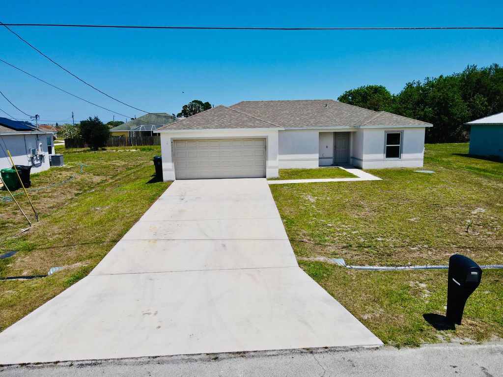 Photo of 4111 SW Baltic Street, Port Saint Lucie, FL 34953 (MLS # B26019228)