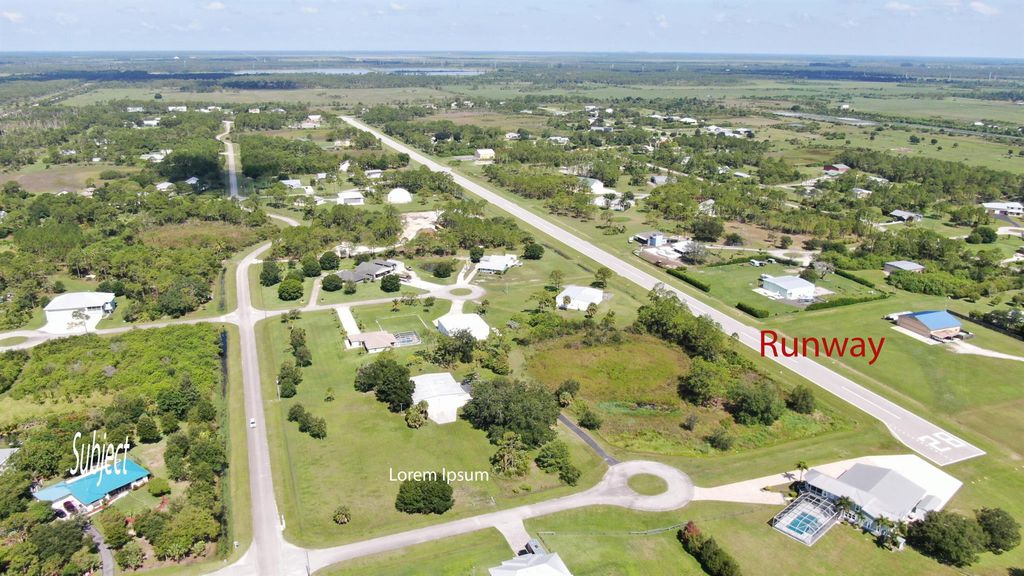 Photo of 12451 Piper Cub Ter, Port Saint Lucie, FL 34987 (MLS # R10972297)