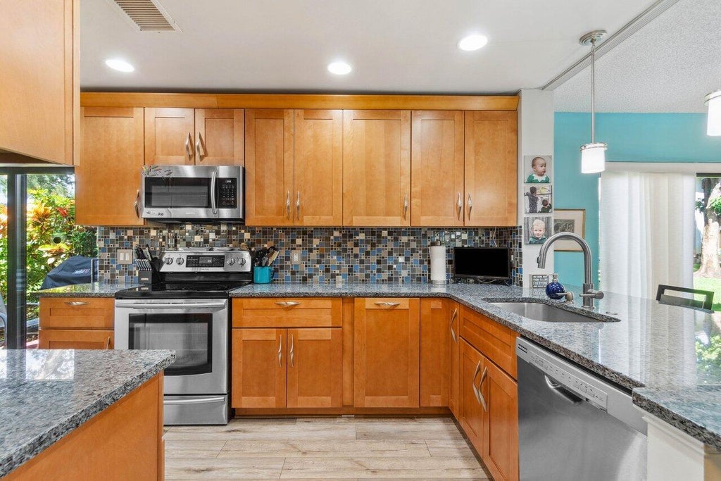 Photo of 52 Stratford Lane #A, Boynton Beach, FL 33436 (MLS # R10925401)