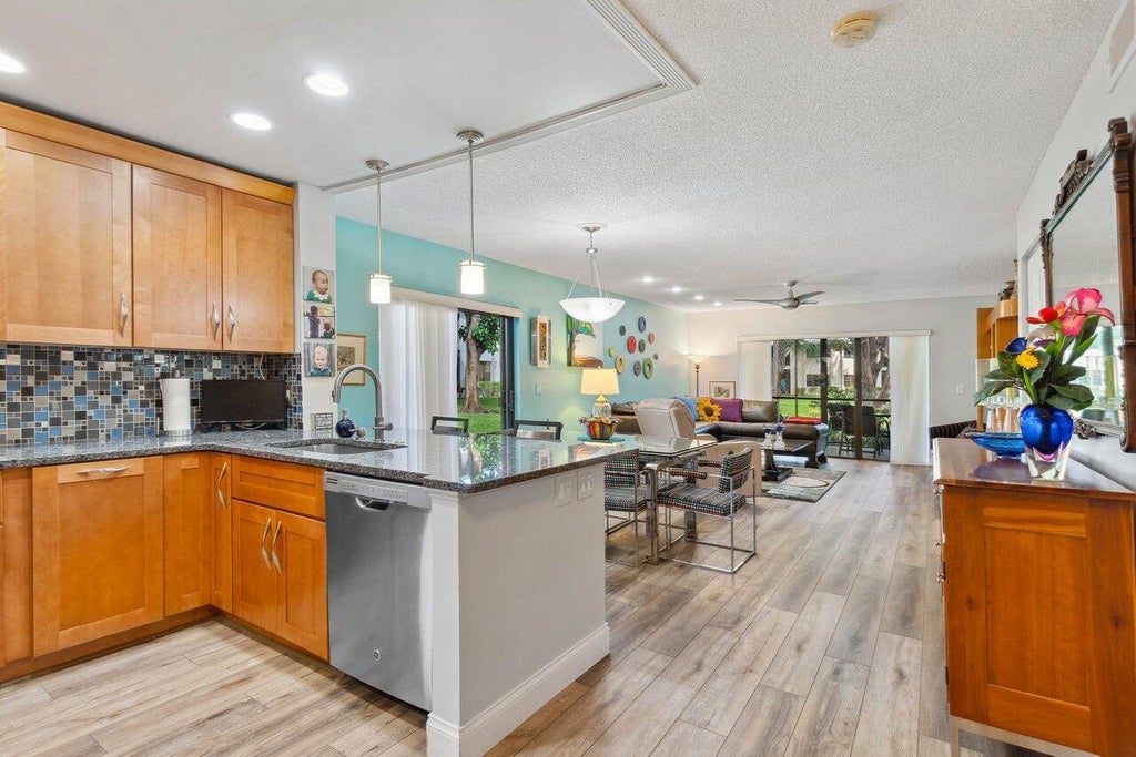 Photo of 52 Stratford Lane #A, Boynton Beach, FL 33436 (MLS # R10925401)