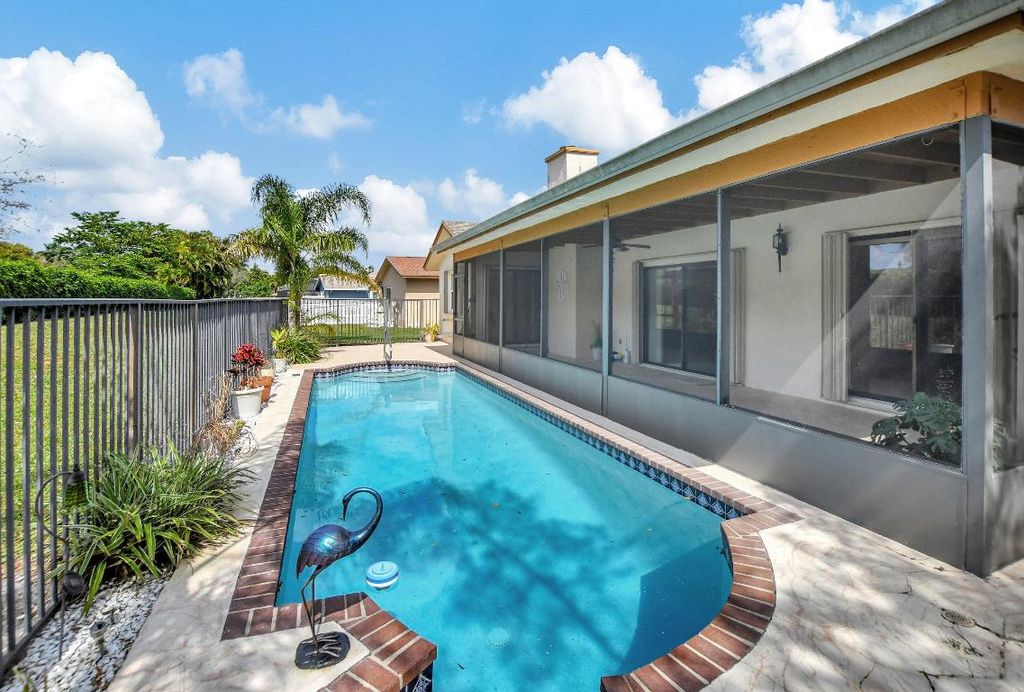 Photo of 20870 Sugarloaf Lane, Boca Raton, FL 33428 (MLS # R10960308)
