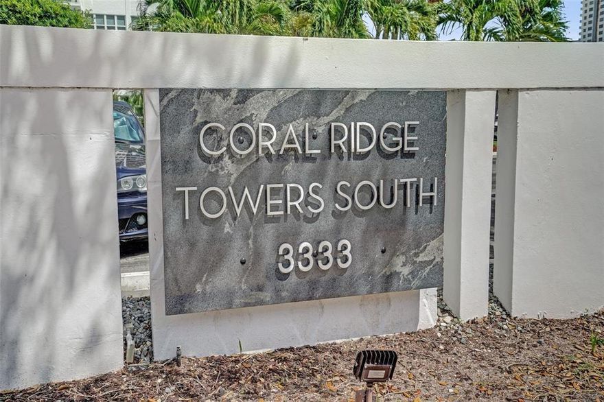 POOL VIEW - remarkable 55+ corner residence in Coral Ridge Towers South offers comfort, convenience, and the perfect SFL lifestyle. This turnkey condo has been meticulously maintained and updated, featuring impact windows, a well maintained HVAC, and brand new glass patio panels that showcase beautiful pool views. Perfectly positioned as a quiet corner unit at the end of the hallway, this home offers added privacy and convenient access to the emergency stairway. The spacious layout is ideal for both everyday living and hosting guests comfortably. Residents enjoy an array of amenities, including 24hr security, a heated pool, fitness center, library, laundry facilities, and social spaces. You'll also be just moments from restaurants, shopping, and entertainment!