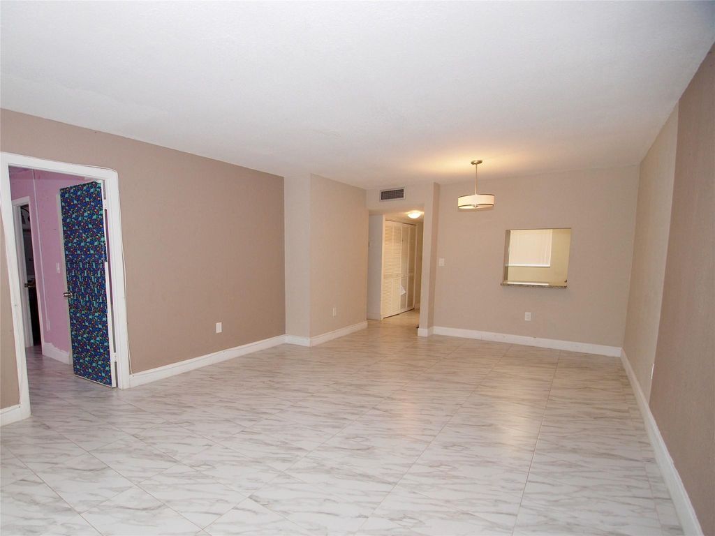 Photo of 7320 NW 85th Court #101, Tamarac, FL 33321 (MLS # F10466744)