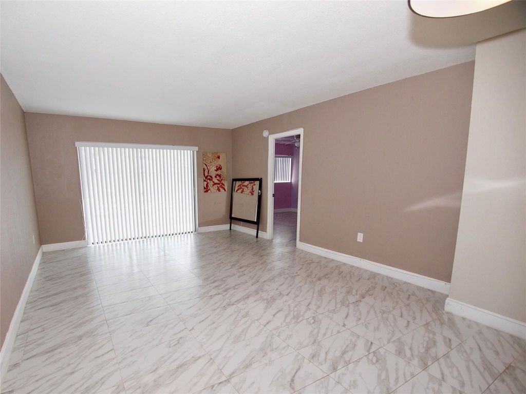 Photo of 7320 NW 85th Court #101, Tamarac, FL 33321 (MLS # F10466744)