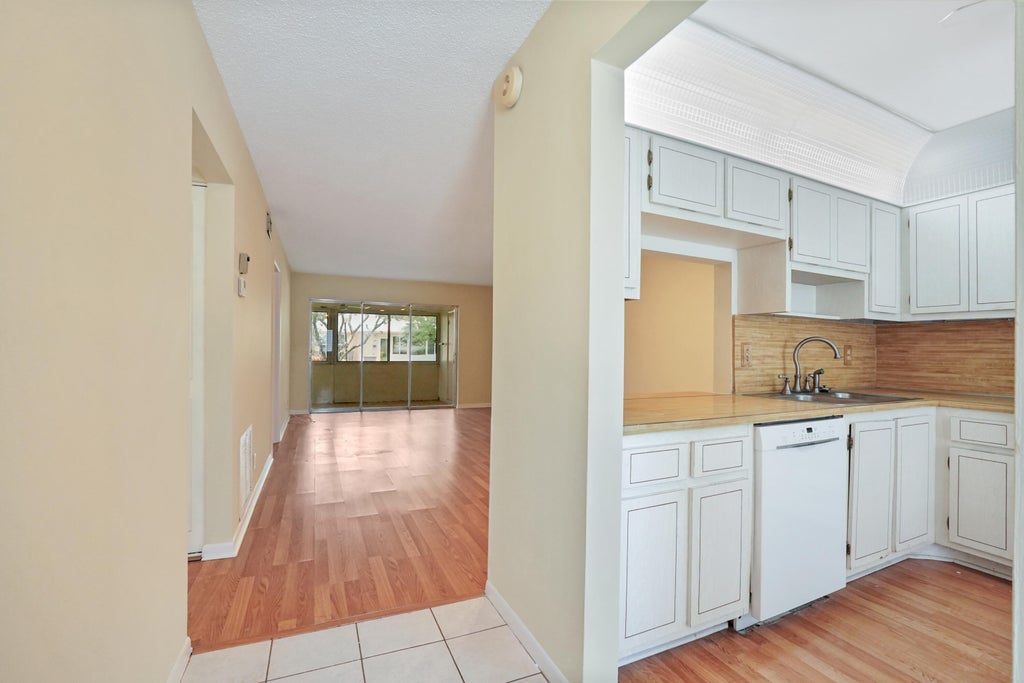 Photo of 551 Covered Bridge Boulevard, Lake Worth, FL 33467 (MLS # R10999782)