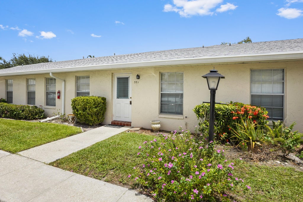 Photo of 551 Covered Bridge Boulevard, Lake Worth, FL 33467 (MLS # R10999782)