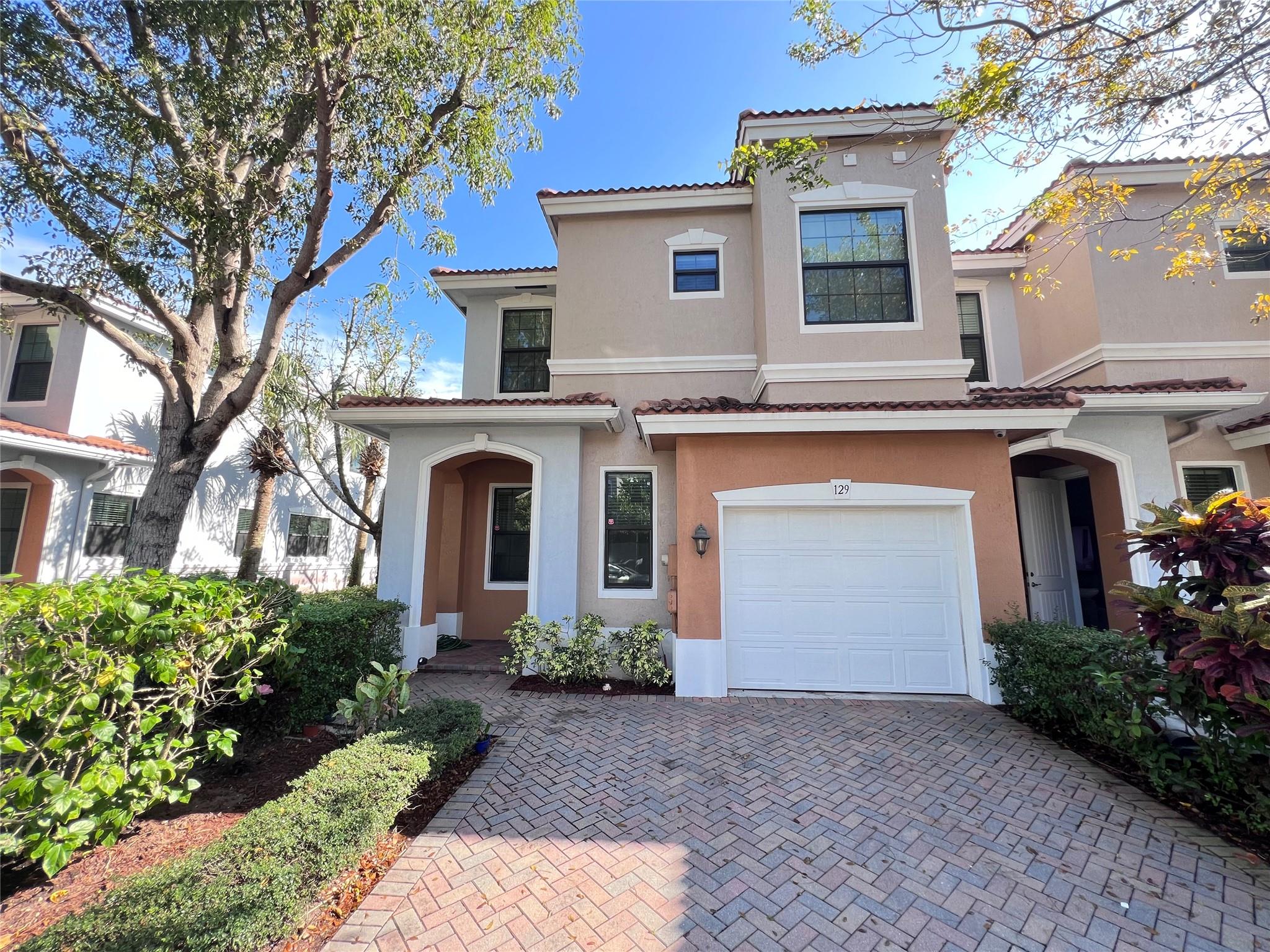 This well maintained 3/2/1 townhouse includes a large open floor plan with oversized master bedroom. It has tile downstairs and high end new floor upstairs. The spacious open living/ dinning room area leads into upgraded kitchen with granite counter top and stainless steel appliances. Nice private backyard is overlooking the beautiful, long lake view and is perfect for grilling and entertaining. Freshly painted interior and upgraded impact doors/ windows make this home move-in ready. Gramercy Square is a family and pet friendly community with pool, gym and playground.