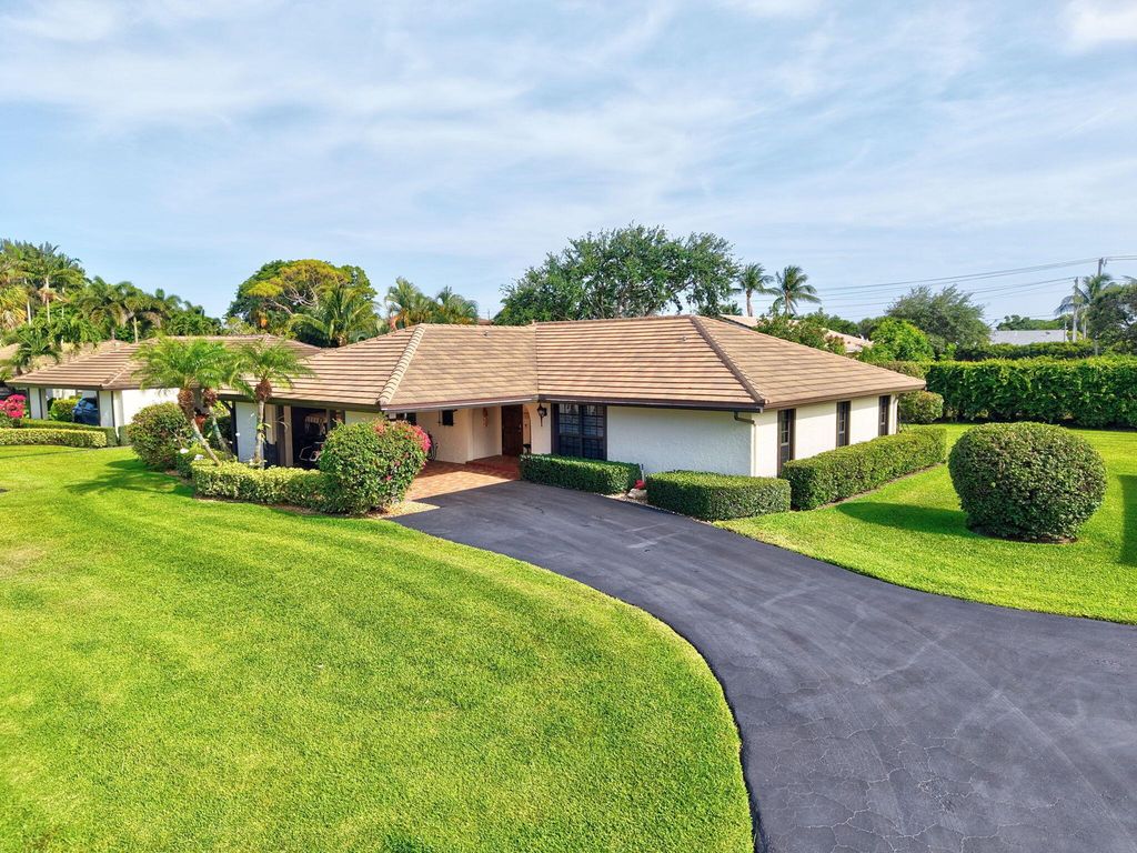 Photo of 438 Pine Villa Drive, Atlantis, FL 33462 (MLS # R11093536)