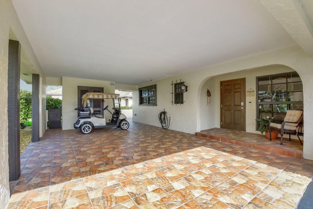 Photo of 438 Pine Villa Drive, Atlantis, FL 33462 (MLS # R11093536)