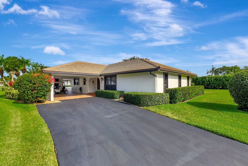 Photo of 438 Pine Villa Drive, Atlantis, FL 33462 (MLS # R11093536)