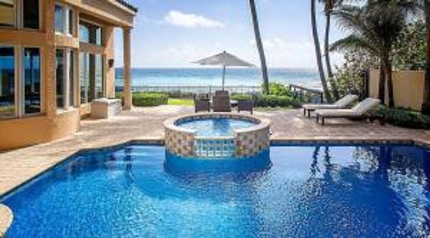 Palatial 6 bedroom oceanfront estate with dazzling panoramic ocean views in the highly sought after Ocean Place Estates in Highland Beach. Designed by acclaimed architect Tom Benedict, this seaside escape incorporates elegance with thoughtful functionality in an inspired transitional design. Over 9,000 square feet of gracious living on a high elevated site including a first floor guest suite/nanny quarters, two story grand foyer, oceanview salon with fireplace, private office/library with pecky cypress ceiling, and upgraded club room with full kitchen and bath. The gourmet kitchen with gas cook top, butlers pantry, and breakfast nook offers magnificent seascapes and opens up to a covered loggia, resort style pool, and your own pristine beach. All bedrooms have en suite baths,