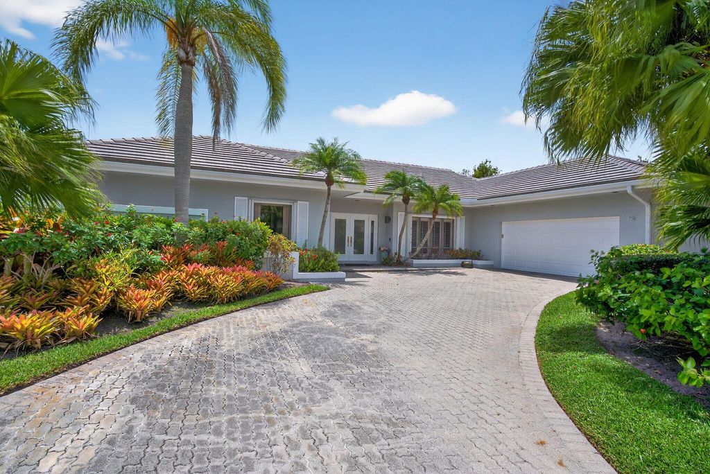 Photo of 31 Dunbar Road, Palm Beach Gardens, FL 33418 (MLS # R11103845)