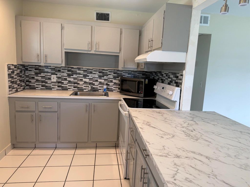 Photo of 64 Waterford C, Delray Beach, FL 33446 (MLS # R11102878)