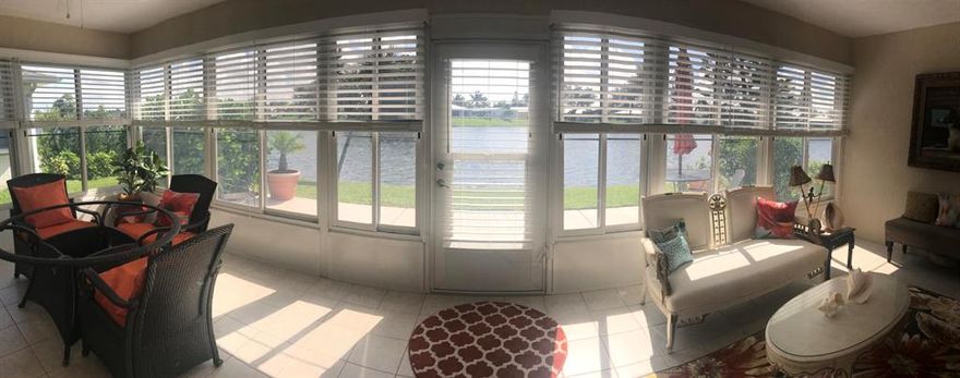 This is a land lease property: $688.24 Per month, This fee includes lot rent, lawn services, security patrol, community on site office and manager. Two swimming pools, 18 hole par 3 golf course, bocce ball,shuffle board, horseshoes,library, billards,exercise room, tennis, game room, and so much more. Water and Sewer fee for 2020 is $264.00. This active 55 plus community has it all. This home, 3/2/2 is well cared for, with great curb appeal, Incredible Lake Views from inside home and while relaxing on the 192 sq feet stamped patio. New Carpet, SS Kitchen Appliances,Just painted garage floor, New light fixtures,A/C 2016,H W Heater 2019, Garage opener 2017,Washer & Dryer 2019,This home as hurricane impact glass except for the sun room. Large Master/W 9x9 closet.Garage has work bench, you will enjoy. Newer shower heads and faucets.Large second bedroom, third bedroom also has walk in closet.Master bath has walk in shower, while the second bath is tub and shower. Catch 20" large mouth bass right out your back door (I did) New custom made blinds in sun room which is 270 sq feet of extra space for you to enjoy. You also get Trash, Recyclables, and Lawn debris,included in the land rent fee. This is the best new deal in Spanish Lakes Fairways.