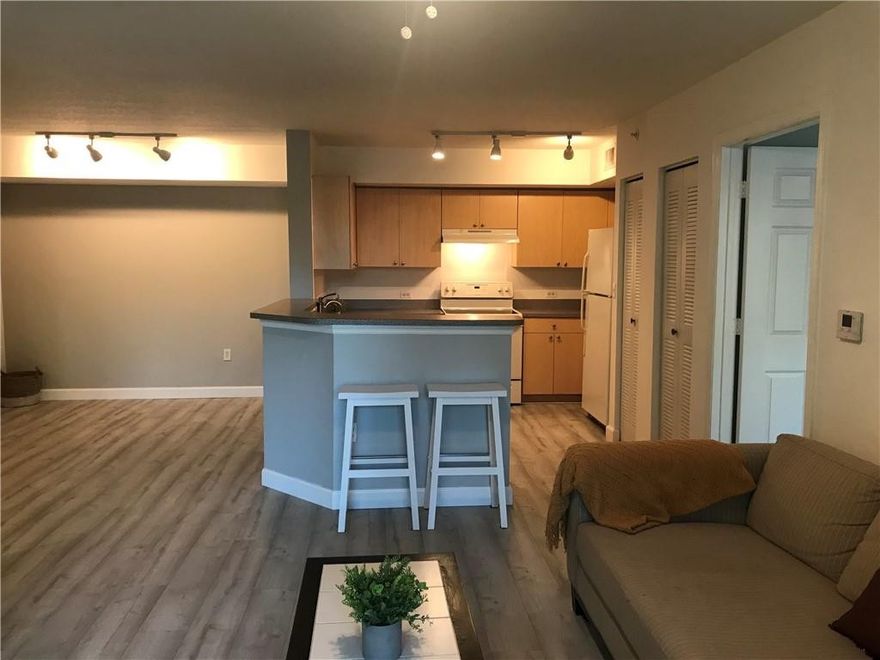 Stop paying rent and own your own property.  This is the only listing in the entire complex that the $24,000 special assessment has already been PAID! That's a savings of nearly $200 per month!! Don't miss this updated unit that includes hurricane windows and a new hot water heater! You'll love the thoughtful updates, like contemporary tile throughout.  There's something for everyone with the extensive amenities. The split floor plan makes it perfect for roommates and families. If you are looking for an investment this is the perfect choice as you can rent immediately.  The community is close to the beach and there's easy access to I-95.  Enjoy the peace of mind of living in a gated community with patrolling security.