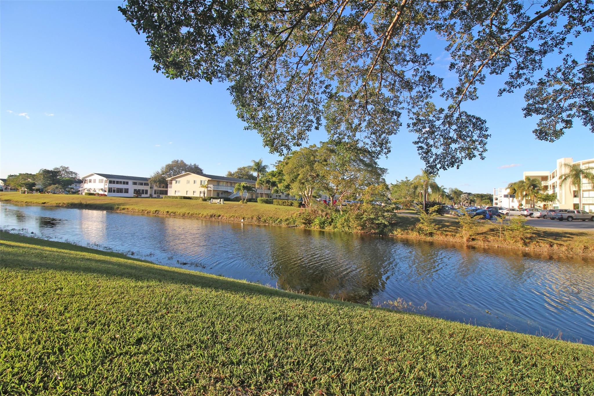 PEACEFUL CANAL VIEW, CONVENIENT 1ST FLOOR, QUAINT U-SHAPED BUILDING! THIS 1 BED, 1 BATH FEATURES A VERY PRIVATE SCREENED PATIO W/ AN EXIT DOOR TO THE CANAL! UNFURNISHED, CARPETED, FRESHLY PAINTED & READY FOR YOU TO MAKE YOUR OWN! THE BATHROOM INCLUDES AN UPDATED VANITY & WALK IN SHOWER. TENANT MUST HAVE 700 CREDIT SCORE AND PROOF OF INCOME! MOVE RIGHT IN AND TAKE ADVANTAGE OF ALL THE GREAT AMENITIES CENTURY VILLAGE EAST HAS TO OFFER! THERE'S A 5 STAR CLUBHOUSE W/STATE OF THE ART GYM. 2.5 WALKING/ JOGGING PATH UNDER THE TREES! CLUBS AND CLASSES OF ALL SORTS! DANCING, SINGING, BILLIARDS, PICKLEBALL, TENNIS, SHUFFLEBOARD, 15 SWIMMING POOLS, KARAOKE, PAINTING, SCUPTING..YOU NAME IT AND IT'S HERE AT CENTURY VILLAGE! CLOSE TO ALL MAJOR HWYS AND GREAT EATERIES! ASSOC. CLAIMS 55+