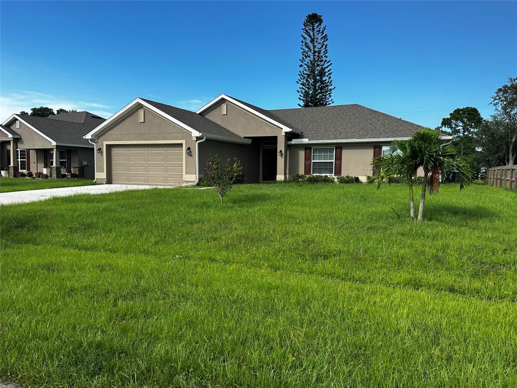 Photo of 1691 SW Angelico Ln, Port St Lucie, FL 34984 (MLS # F10394830)