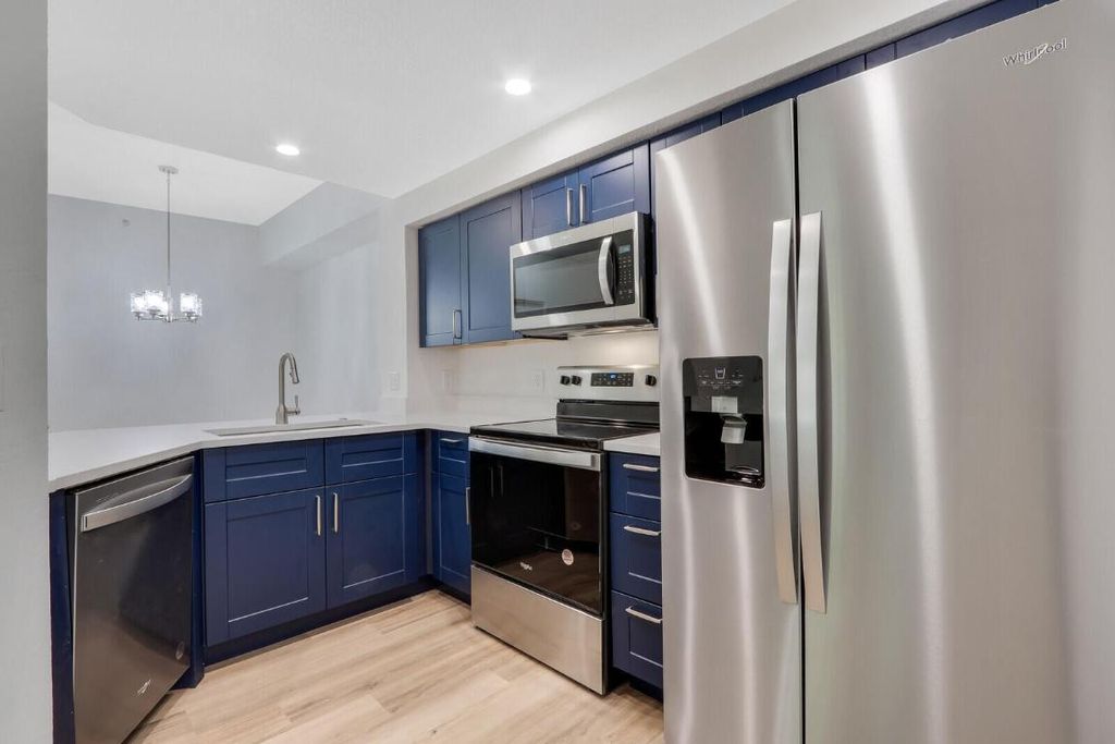 Photo of 3023 Alcazar Place #203, Palm Beach Gardens, FL 33410 (MLS # R11136727)