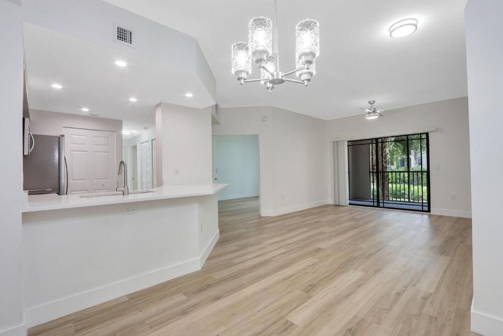 Photo of 3023 Alcazar Place #203, Palm Beach Gardens, FL 33410 (MLS # R11136727)