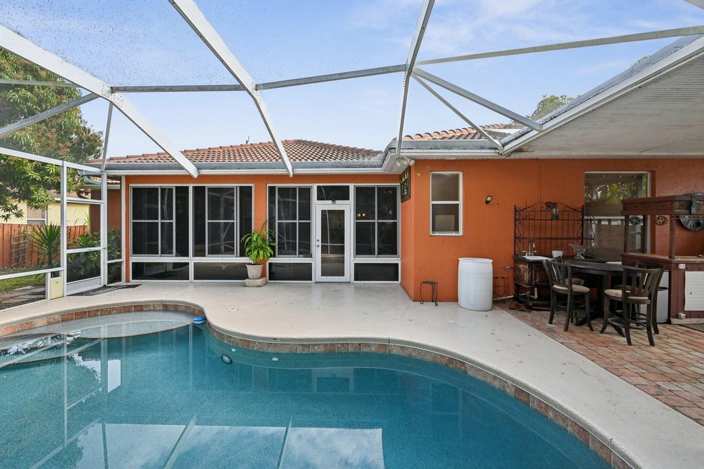 Photo of 3044 SW Savona Boulevard, Port Saint Lucie, FL 34953 (MLS # R11157388)