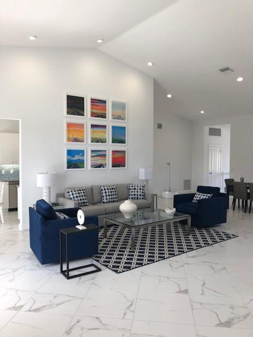 AMAZING RENTAL OPPORTUNITY IN ADMIRALS COVE  TOTALLY RENOVATED 2ND FLOOR HARBOR HOME WITH BREATHTAKING WATER AND GOLF VIEWS AND PRIVATE ELEVATOR.   NEW KITCHEN, BATHROOMS, FLOORS AND FURNITURE.  INCLUDES DOCK FOR UP TO 34 FT BOAT.  OUTSTANDING LOCATION CLOSE TO CLUBHOUSE , MARINA, TENNIS CTS, RESORT POOL, RESTAURANTS AND FITNESS YET PEACEFUL AND QUIET