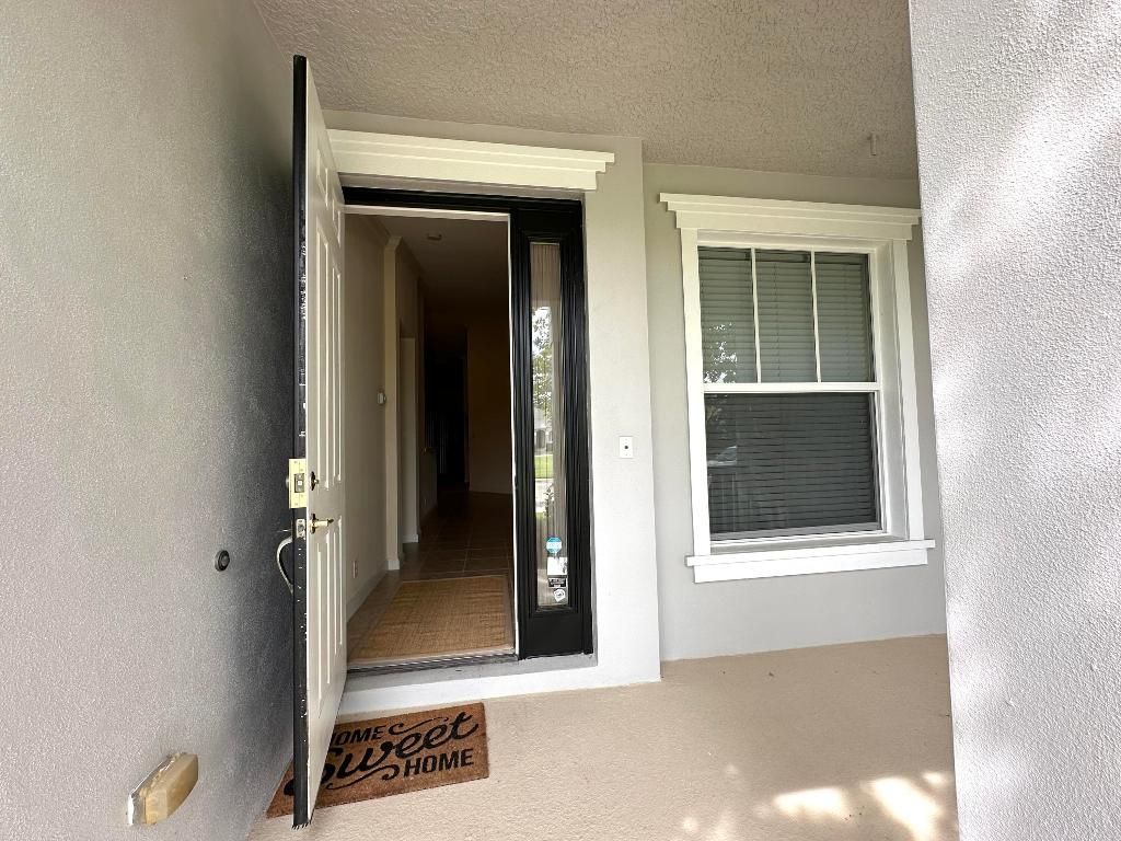 Photo of 10479 SW Westlawn Boulevard, Port Saint Lucie, FL 34987 (MLS # R10925680)