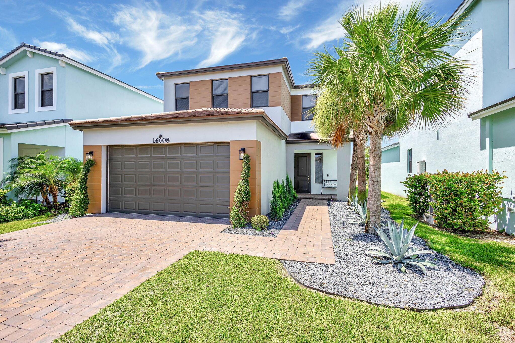 UPSCALE living at its finest. Attention to detail at every turn. Living in this home is pure luxury. The expansive kitchen is perfect for entertaining or homework on the island counter while parents cook dinner. Almost every window has a HUGE lake view! Enjoy summer BBQs on your back patio or just wake up with a hot cup of coffee and relax before starting your day watching the glistening water right from your backyard. Inside, you have a first floor bedroom with ensuite bath and a powder room. Upstairs you have a versatile loft area and 3 spacious bedrooms. This home awaits you!
