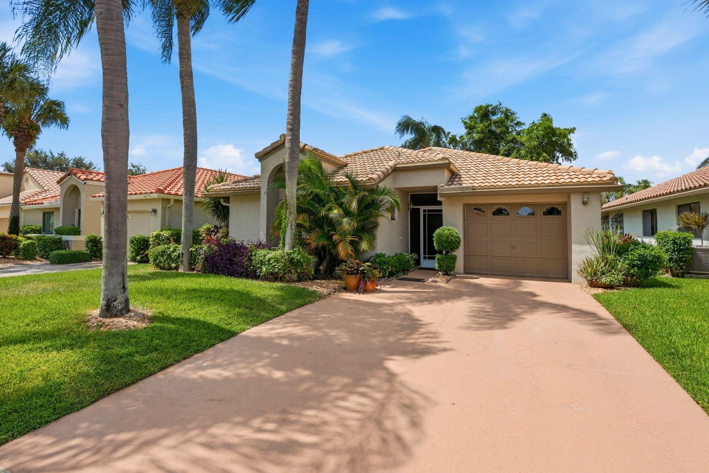 Photo of 6170 BAY ISLES Drive, Boynton Beach, FL 33437 (MLS # B26064034)