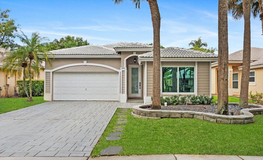 If you are looking for a completely updated home with IMPACT WINDOWS/DOORS in Parkland at a fabulous price, this home is for you. The interior will not disappoint with its light and airy living spaces and has been beautifully reimagined with tasteful finishes. The crisp white kitchen features a large island, quartz counters & waterfalls, newer SS appliances including a dual oven, and a coffee bar with a wine fridge. The primary suite is spacious and features a large closet and an updated spa-like bath. Multiple impact glass doors allow for indoor/outdoor living and lead to a large screened porch with a newly resurfaced pool and a new heater. The backyard has expansive greenspace perfect for pets & children to enjoy. Residents enjoy an intimate community, community pool, playground, & more