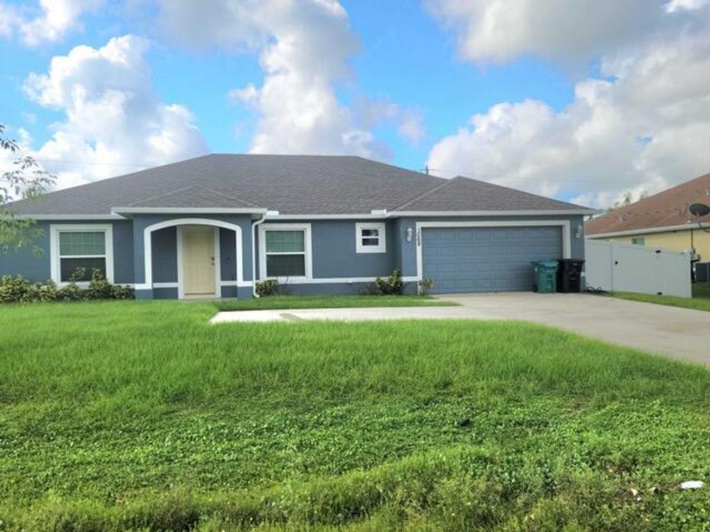 Photo of 1068 SW California Boulevard, Port St Lucie, FL 34953 (MLS # R10920726)