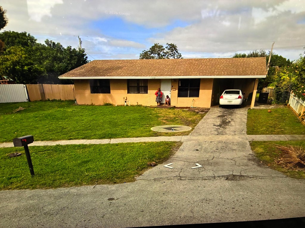 Photo of 1655 44TH Street, West Palm Beach, FL 33407 (MLS # B26071137)